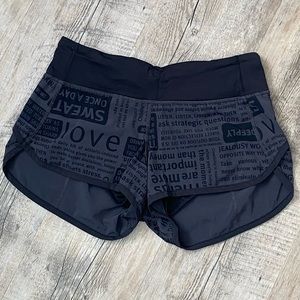 Lululemon charcoal grey with black mantra print Speed Shorts size 2